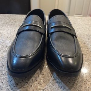 Men’s slip on dress shoes.
